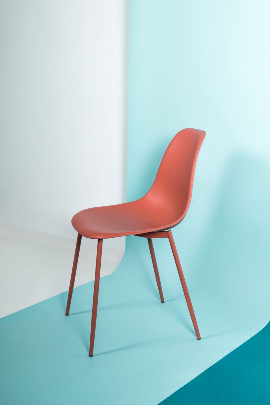 Orange Chair on Blue Background